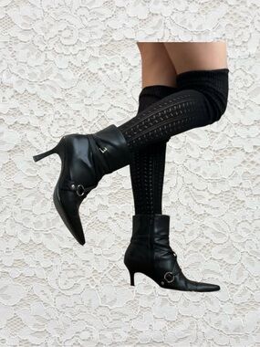 vintage black‎ leather heel boots with strap and buckle details
